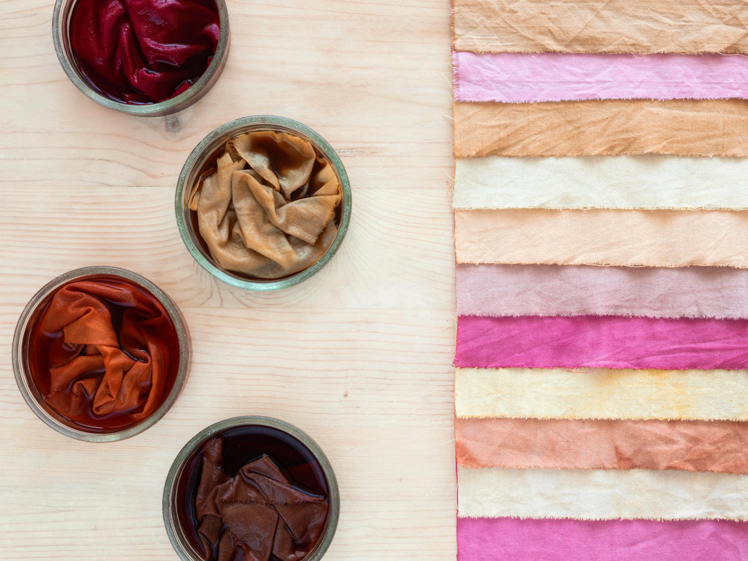 Natural fabric dyeing swatches in earthy tones, showcasing Kadam Colors’ eco-friendly dyes for sustainable textile art.