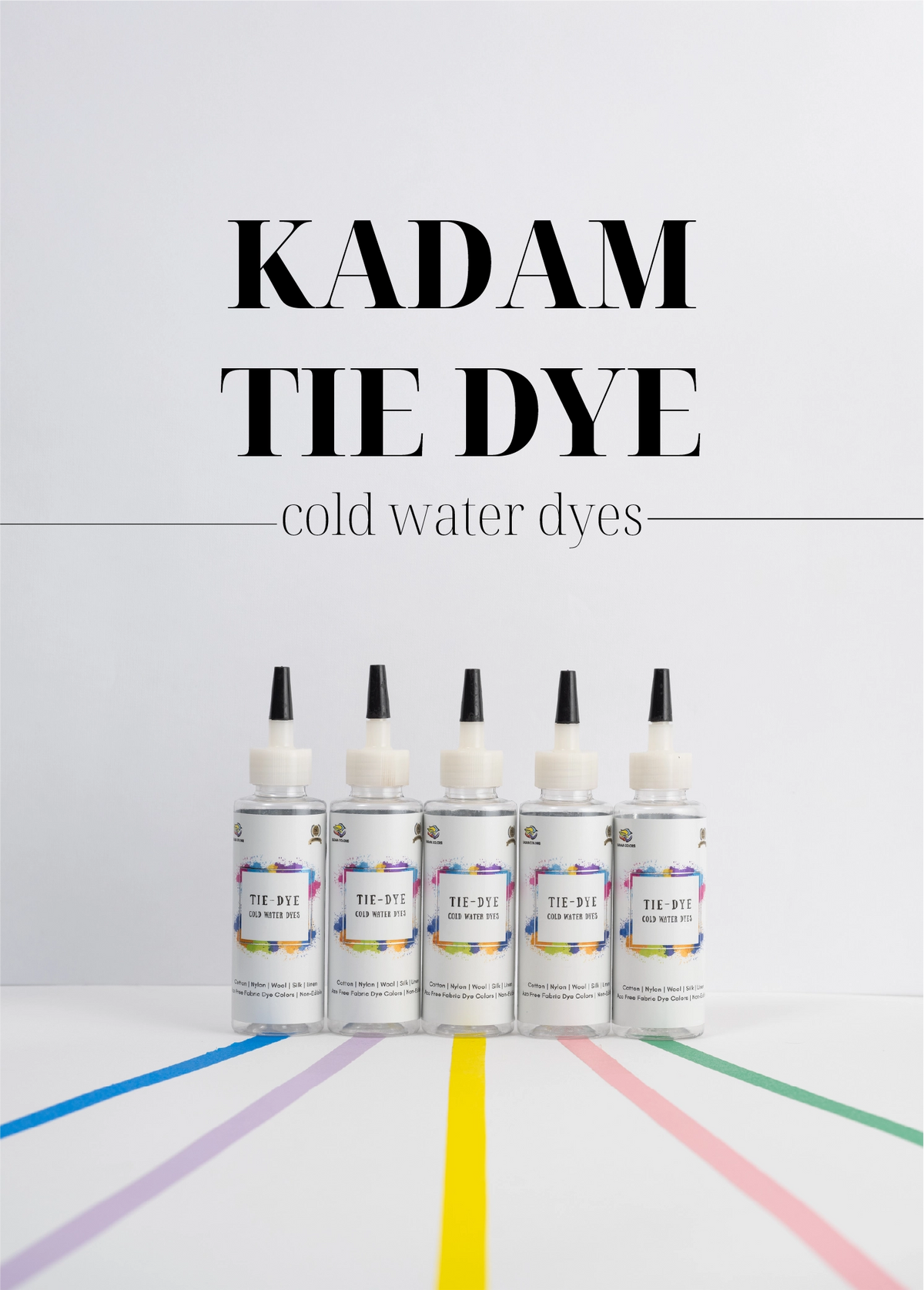 Five bottles of Kadam Tie Dye cold water dyes in vibrant colors displayed on a white background with colorful streaks, perfect for creating unique and vivid tie-dye designs.