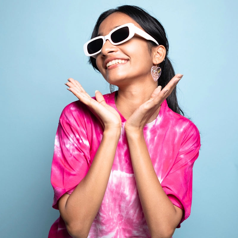 Woman wearing pink tie-dye barbie co-od set dyed with Kadam tie dye.