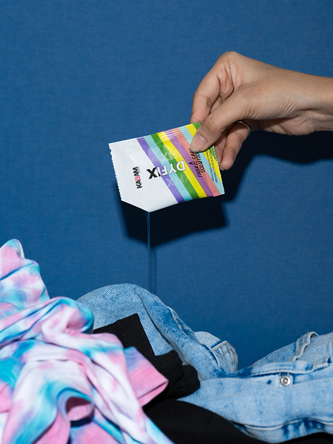 Kadam DyFix sachet to prevent color bleeding in clothes.