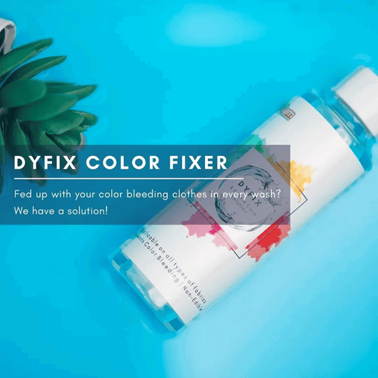 Washing excess dye from fabric after soaking in Kadam DyFix color-protective solution.
