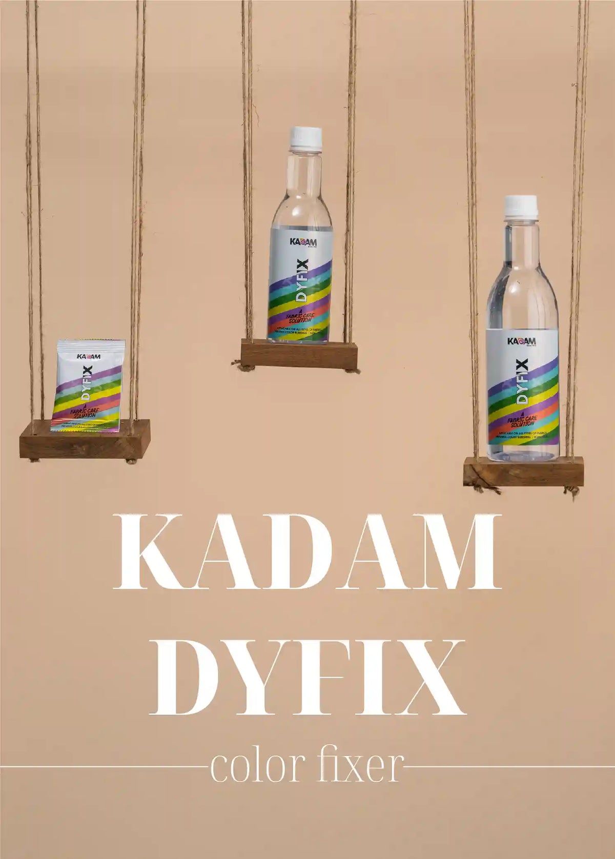 Kadam Dyfix color fixer products, including a small packet and two bottles, displayed creatively on wooden swings against a beige background, highlighting their effectiveness in locking colors and enhancing fabric durability