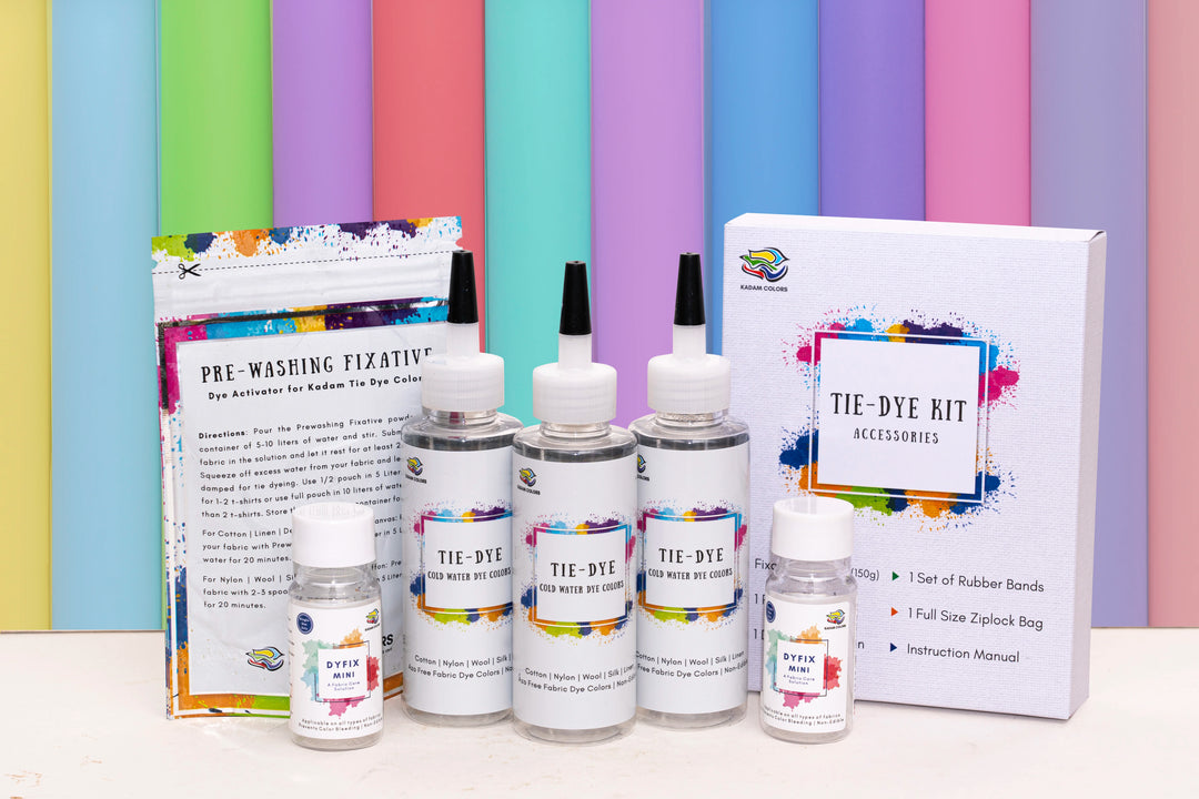 Kadam Colors Tie-Dye Kit with bottles, DyFix, and pre-washing fixative—cold water dyes for creative DIY fabric projects.