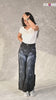 Redyeing stained or faded jeans to deep black using Kadam Pakka Rang Jeans Black dye – restore old denim to look brand new.